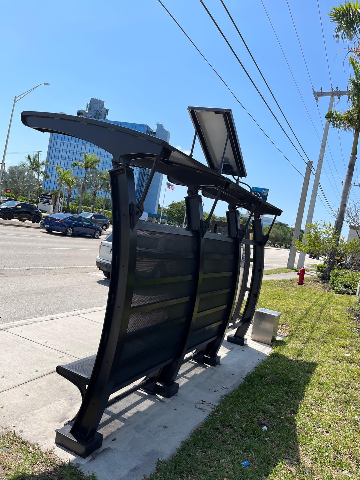Pompano Beach transit shelter after repainting — finished black