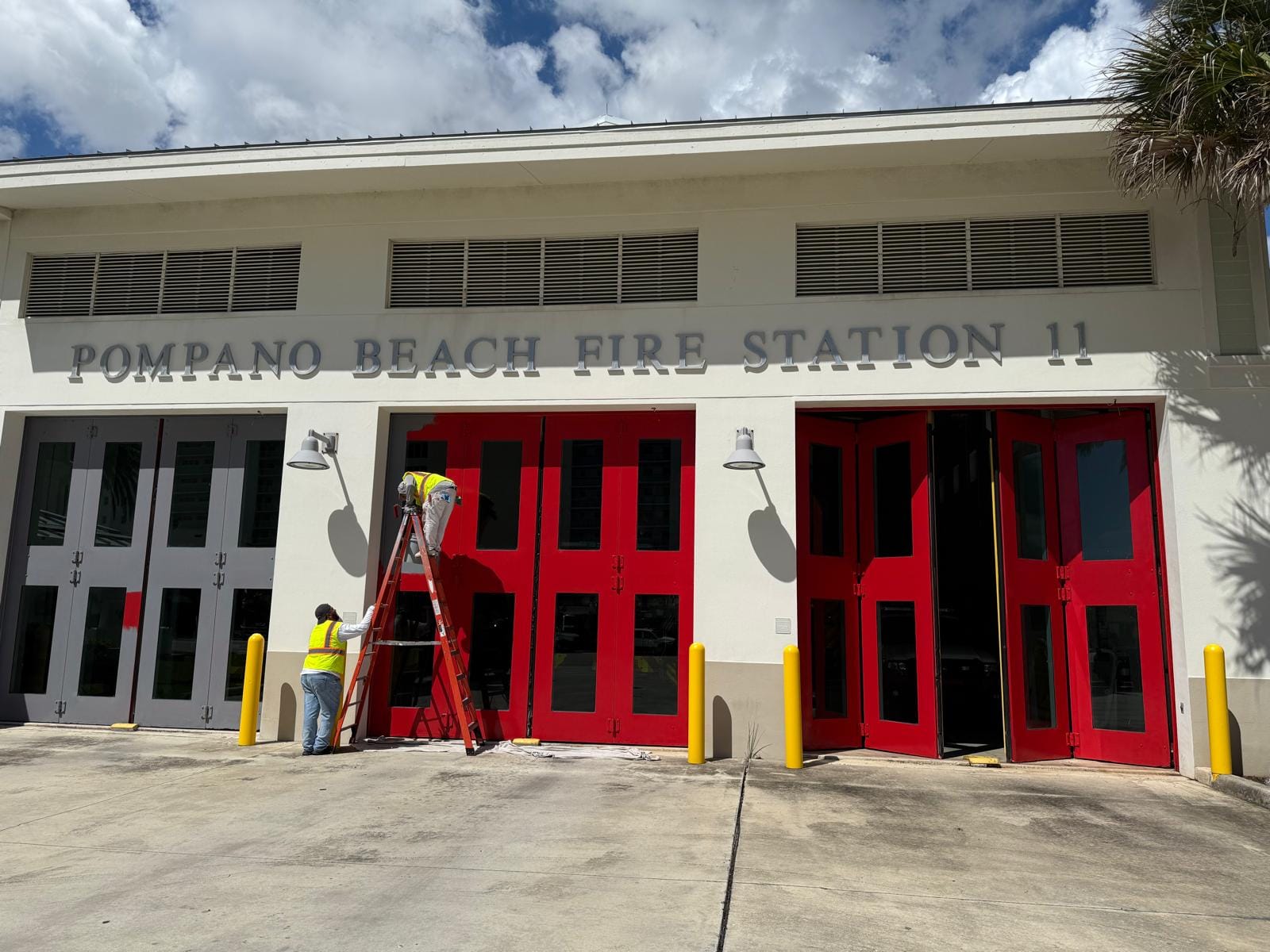 Pompano Beach Fire Station 11 exterior during door and facade finishing work