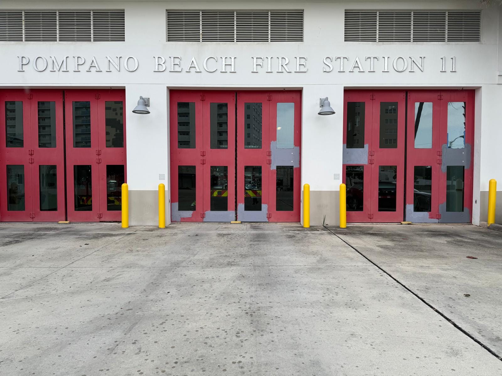 Pompano Beach Fire Station 11 bay doors with primer work in progress